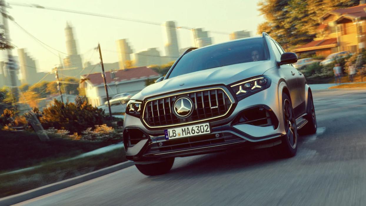 A Mercedes-AMG GLE SUV with a city in the background