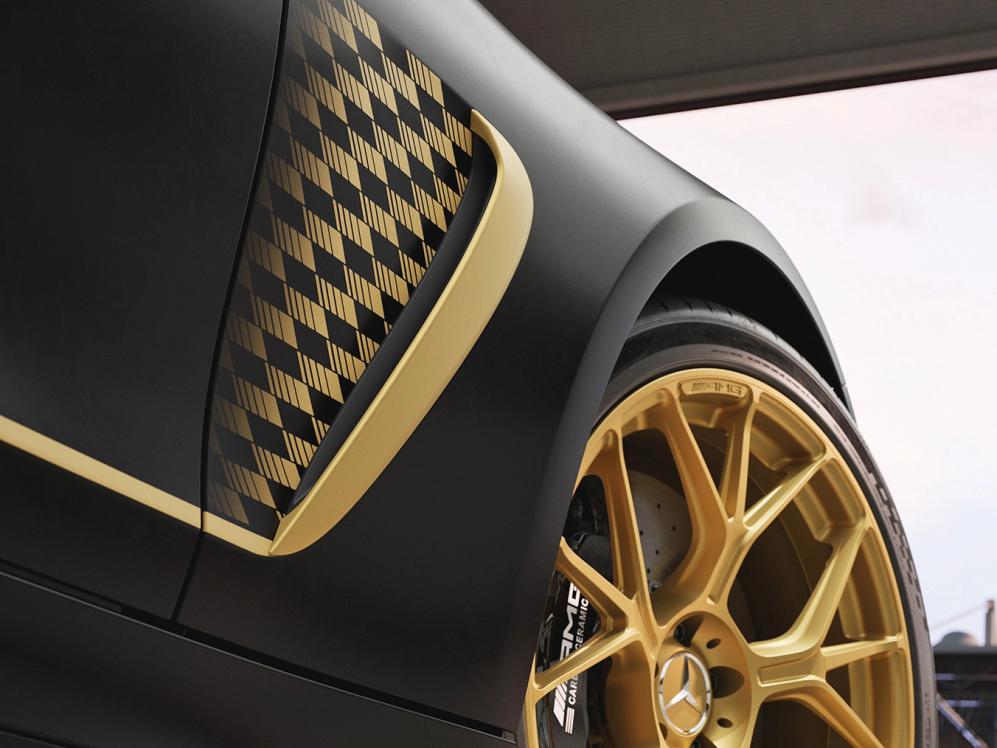Detailed view of chequered pattern and AGXGP Edition alloy wheels.