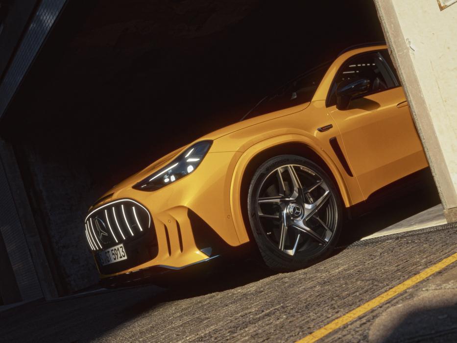 The Mercedes-AMG GT 55 SUV is parked in a garage