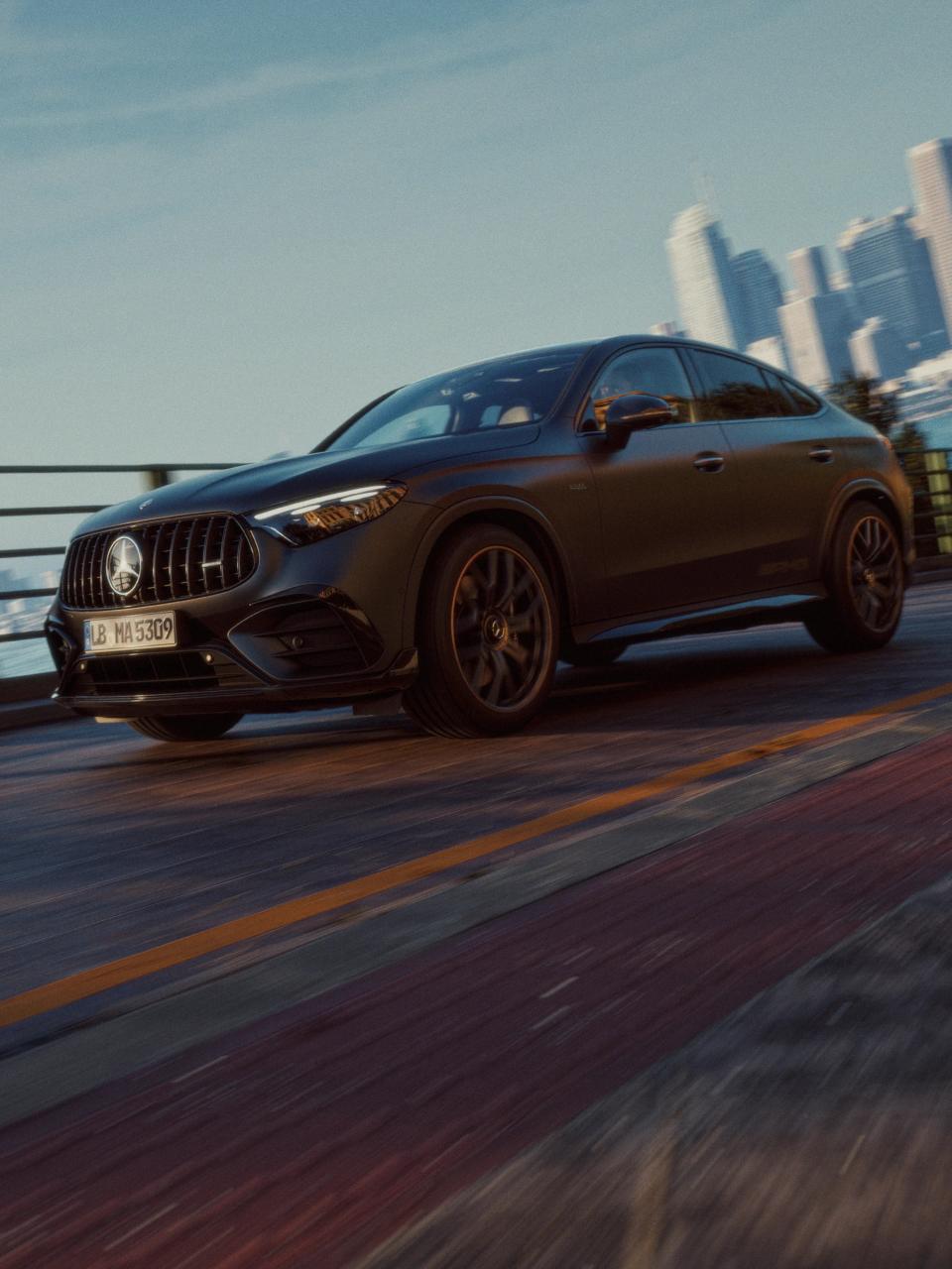 Mercedes-AMG GLC 53 4MATIC+ Coupé in an urban setting on a bridge