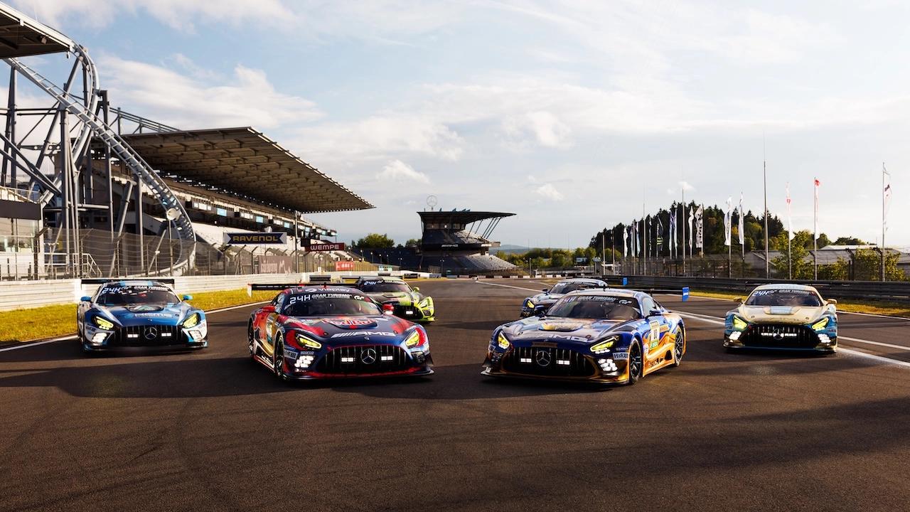 Mercedes-AMG GTs parked on a straight section of a racetrack