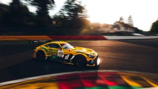 A Mercedes-AMG GT taking a bend on the racetrack
